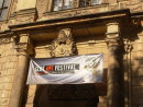 Zdjęcie przedstawia wiszącą reklamę Slot Art Festival